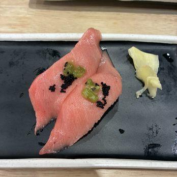 Sushi REV - Toro nigiri, fatty tuna with black tobiko and something slightly spicy on top - Sushi Bars Near Me - Irvine, California Sushi REV - Toro nigiri, fatty tuna with black tobiko and something slightly spicy on top - Sushi Bars Near Me - Irvine, California