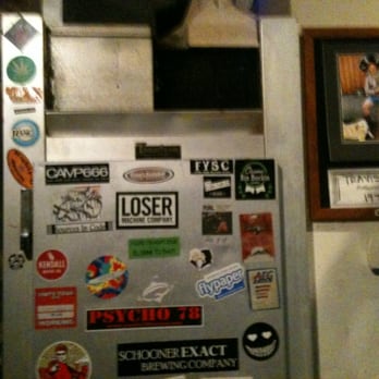 Magoo's - a refrigerator covered in stickers - Pubs Near Me - Tacoma, Washington Magoo's - a refrigerator covered in stickers - Pubs Near Me - Tacoma, Washington