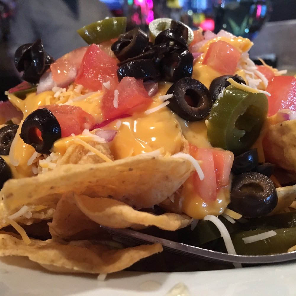 Heroes Tap House - This Nacho Mountain is not full size because Lynette had them hold the meat. "Our food portions are the same as make them at home." Indeed! - Tabletop Games Near Me - Salem, Oregon Heroes Tap House - This Nacho Mountain is not full size because Lynette had them hold the meat. "Our food portions are the same as make them at home." Indeed! - Tabletop Games Near Me - Salem, Oregon