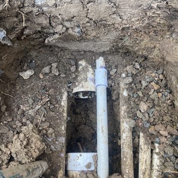 Jones' Sprinkler Solutions - 4" pipe where they tapped there new valves into that goes out into the yard but also right back into the valve box - Irrigation Near Me