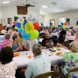 Debbie's Kitchen Catering - Birthday boy in the 80 years breakdown shirt had one of the best birthdays of his life.