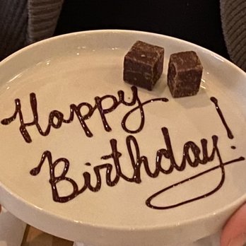 Richmond Station - When I booked the reservation, I put occasion as birthday, and they gave this at the end! (Salted caramel chocolate! Yummy!) - Canadian (New) Near Me - Toronto, Ontario