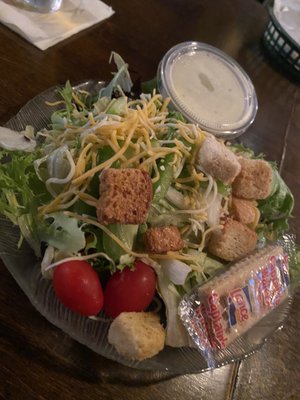 Photo of Phish Tales - Lake City, FL, US. a salad with croutons, lettuce, tomatoes and cheese