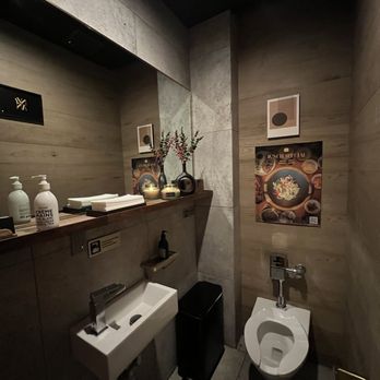 Nubiani - a bathroom with a toilet and sink - Korean Near Me - New York, New York