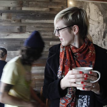 Outerlands - Sunset resident Lauren holding a cup of spike cider and waiting for a table at Outerlands. - New American Near Me - San Francisco, California Outerlands - Sunset resident Lauren holding a cup of spike cider and waiting for a table at Outerlands. - New American Near Me - San Francisco, California