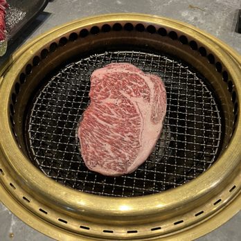 Ishoni Yakiniku - A5 Wagyu Steak on the grill (they'll grill it for you) - Barbeque Near Me - Seattle, Washington Ishoni Yakiniku - A5 Wagyu Steak on the grill (they'll grill it for you) - Barbeque Near Me - Seattle, Washington