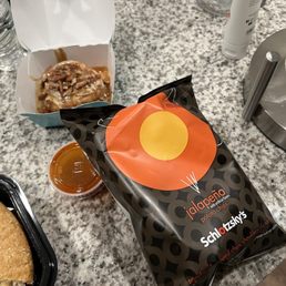 Cinnabon and a bag of jalapeño chips