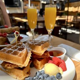 Chicken and waffles + mimosas Chicken and waffles + mimosas