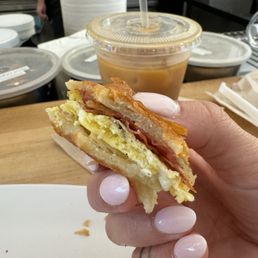 Bacon egg white cheddar on croissant
