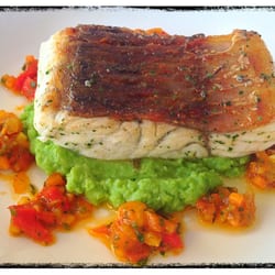 Crispy skin barramundi with smashed peas and Moroccan veg
