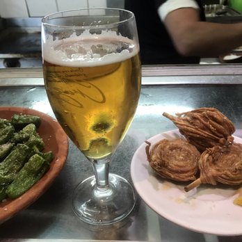 Casa Toni - Fried peppers, caña of beer, lamb intestines. Awesome combo! - Tapas/Small Plates Near Me - Madrid, M