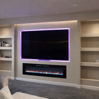Four Leaf Home Integration - Media Wall constructed in the basement - the fireplace also heats the space! - Security Systems Near Me - Poughkeepsie, New York Four Leaf Home Integration - Media Wall constructed in the basement - the fireplace also heats the space! - Security Systems Near Me - Poughkeepsie, New York