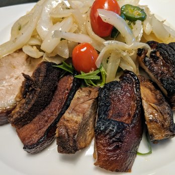 Shiro Restaurant - Tender, fragrant pork belly with onions, tomatoes, and jalapeno peppers. - Japanese Near Me - Novi, Michigan Shiro Restaurant - Tender, fragrant pork belly with onions, tomatoes, and jalapeno peppers. - Japanese Near Me - Novi, Michigan