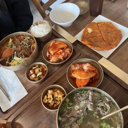 Gomtang, yukgaejang, mini kimchi pajeon Gomtang, yukgaejang, mini kimchi pajeon
