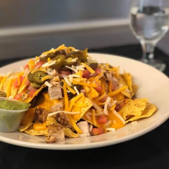 Red Fire American Grill - Nachos with a side of guacamole - Bars Near Me - Essington, Pennsylvania Red Fire American Grill - Nachos with a side of guacamole - Bars Near Me - Essington, Pennsylvania