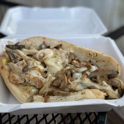 Casey's Pizza & Grill - Chicken Cheese Steak (9") with LTM fried onions and mushrooms. Really good!