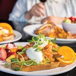 Brunch featuring Avocado toast, French toast, along with an espresso martini