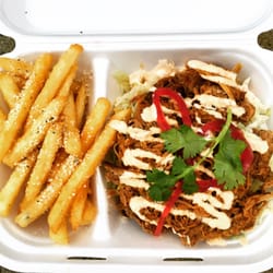 Roaming Fork - Adobe habanero coffe Latino mojo pork w/ yellow rice, roasted corn, red pepper, lettuce, chipotle aioli, pickled onion, cilantro, and bacon