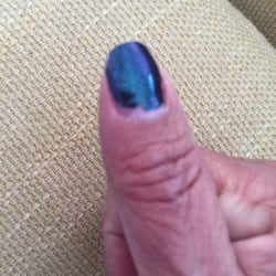 Total Look Beauty Studio - Nail polish doesn't reach base of nail or sides of nail. Chipped after one day.
