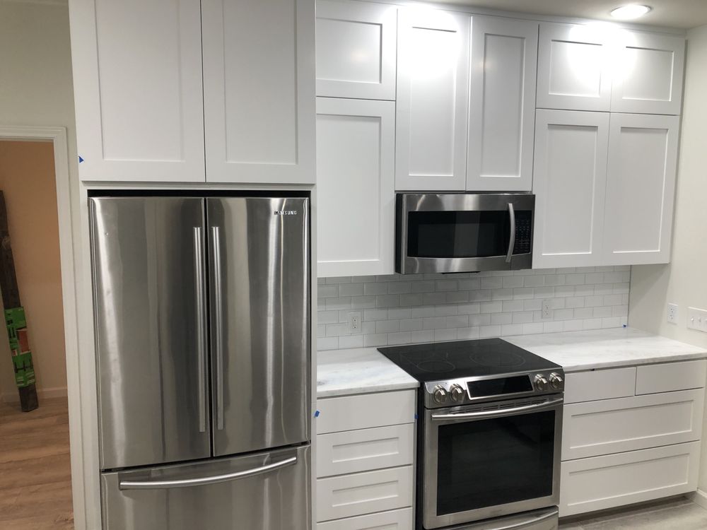 Slide of R.O.I. Roofing & Construction 