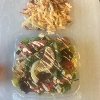 Ishtar Gate - Mix kabab over salad with fries. - Mediterranean Near Me - Portland, Oregon Ishtar Gate - Mix kabab over salad with fries. - Mediterranean Near Me - Portland, Oregon