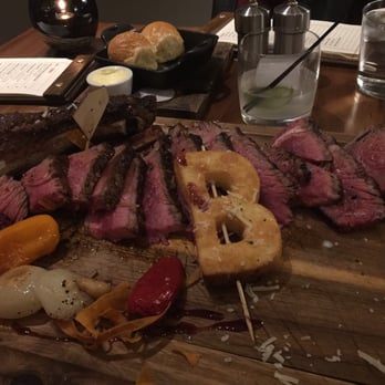 The Bancroft - 42oz Tomahawk Chop cooked medium rare. - New American Near Me - Burlington, Massachusetts The Bancroft - 42oz Tomahawk Chop cooked medium rare. - New American Near Me - Burlington, Massachusetts