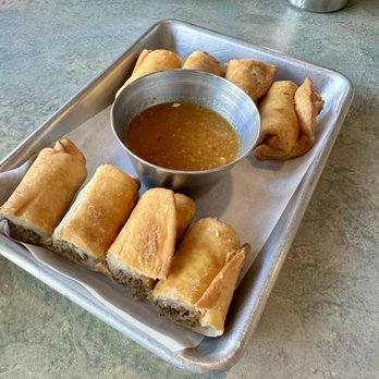 Blue Fish - Kahlúa pork egg rolls (rolled in tortillas ) - Hawaiian Near Me - Medford, Oregon Blue Fish - Kahlúa pork egg rolls (rolled in tortillas ) - Hawaiian Near Me - Medford, Oregon