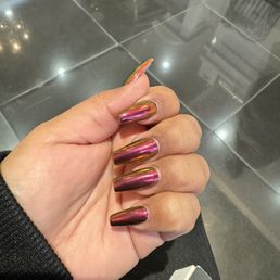 Full set with black gel and chrome. Full set with black gel and chrome.