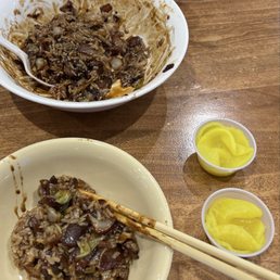 Added extra rice to finish the jajangmyeon sauce Added extra rice to finish the jajangmyeon sauce