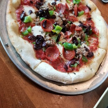 Monkeypod Kitchen - Happy hour supreme style pizza - Hawaiian Near Me - Kapolei, Hawaii Monkeypod Kitchen - Happy hour supreme style pizza - Hawaiian Near Me - Kapolei, Hawaii