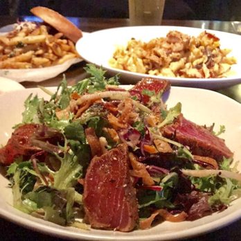 Yard House - Small Ahi Crispy Salad (in the back: Hot Chicken Sandwich w/ Truffle Fries & Mac-n-Cheese) - New American Near Me - Yonkers, New York Yard House - Small Ahi Crispy Salad (in the back: Hot Chicken Sandwich w/ Truffle Fries & Mac-n-Cheese) - New American Near Me - Yonkers, New York