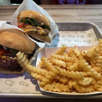 Shake Shack Wrigleyville - ShackBurgers w/ fries - Burgers Near Me - Chicago, Illinois Shake Shack Wrigleyville - ShackBurgers w/ fries - Burgers Near Me - Chicago, Illinois