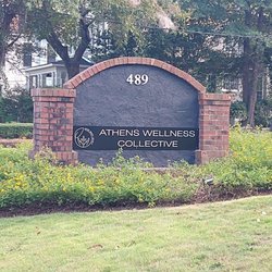 Healing Farmacy - Street sign - we are a part of Athens Wellness Collective