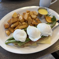 The Bistro On Main - Healthy Benedict with Swiss cheese, smoked salmon and asparagus. Hollandaise sauce on the side.