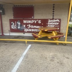 Picnic table outside for dining.