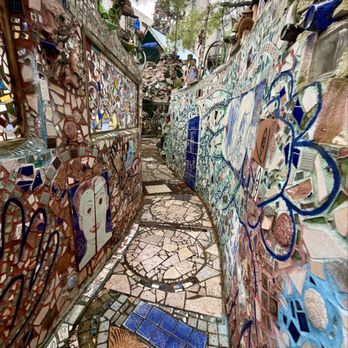 Philadelphia's Magic Gardens - Mosaic-covered walls and path at Magic Gardens - Art Galleries Near Me - Philadelphia, Pennsylvania Philadelphia's Magic Gardens - Mosaic-covered walls and path at Magic Gardens - Art Galleries Near Me - Philadelphia, Pennsylvania