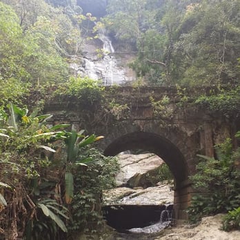 Parque Nacional da Tijuca - View of the waterfall from lower down the road. - Parks Near Me - Rio de Janeiro, RJ Parque Nacional da Tijuca - View of the waterfall from lower down the road. - Parks Near Me - Rio de Janeiro, RJ