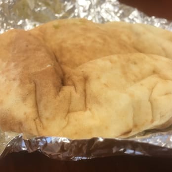 Naf Naf Grill - not much to look at on the outside, but the inside of this shawarma pita is packed with pops of meaty, tangy and spicy flavor. - Middle Eastern Near Me - Minneapolis, Minnesota Naf Naf Grill - not much to look at on the outside, but the inside of this shawarma pita is packed with pops of meaty, tangy and spicy flavor. - Middle Eastern Near Me - Minneapolis, Minnesota