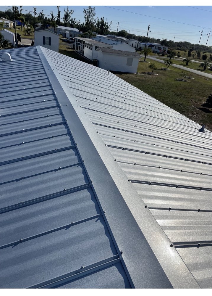Slide of Ark Roofing and solar