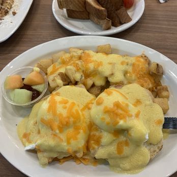 Stacked Pancake & Breakfast House - Peameal benedict with holly potatoes - Breakfast & Brunch Near Me - Edmonton, Alberta Stacked Pancake & Breakfast House - Peameal benedict with holly potatoes - Breakfast & Brunch Near Me - Edmonton, Alberta