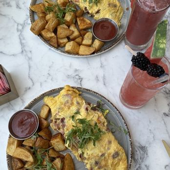 The Corner - Meat Lover's Omelette with a side of potatoes(no chorizo), Prime Time Cocktail, and a Berry Mocktail - Breakfast & Brunch Near Me - Glendale, California