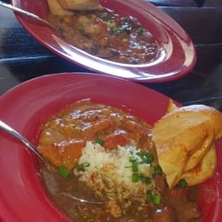 Roux Dat - Half and half plates:(T) Crawfish Etouffee/Red Beans & Sausage.(B) Andouille, Shrimp & Chicken Jambalaya/Chicken & Sausage Gumbo