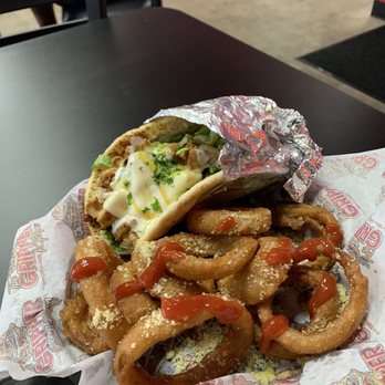 The Gripper Kitchen - The grilled chicken pita with onion rings was delicious. I really enjoyed this. - Fast Food Near Me - Pearland, Texas