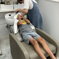 Getting hair shampooed 7.13.24