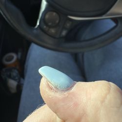 Beth's Nails & Spa - Powder left on the nails and gel not covering the whole nail.