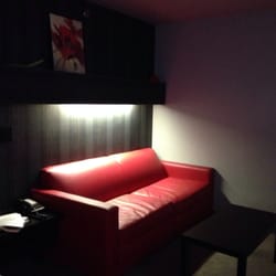 Metropolis Resort - King room with couch and kitchenette.
