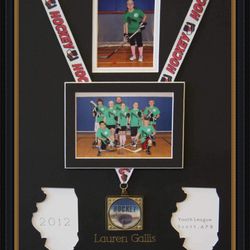 Elite Framing - Framed sports photos with medal