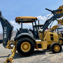 Rent 2 Go - John Deere 210L Backhoe