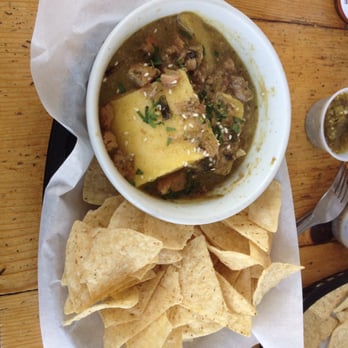 Nopalitos - "Tamale in a bowl" polenta squares with chile verde (minus cheese and sour cream). Comes with a side of the delicious nachos - Mexican Near Me - Sacramento, California Nopalitos - "Tamale in a bowl" polenta squares with chile verde (minus cheese and sour cream). Comes with a side of the delicious nachos - Mexican Near Me - Sacramento, California