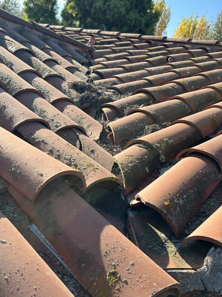 Slide of American Roofmasters Roof Repair